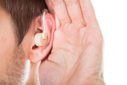 Close-up Of An Ear With Hearing Aid