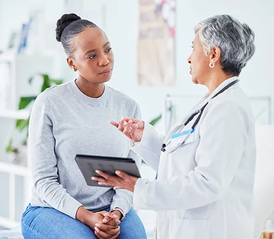ENT Specialist consulting patient
