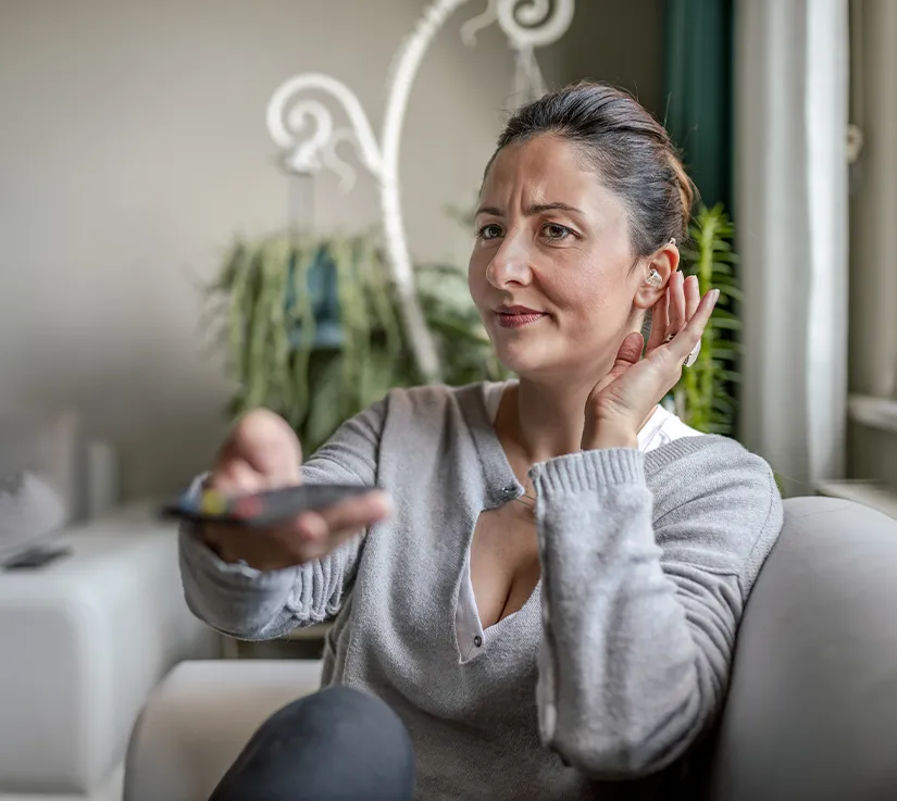 Woman wearing a hearing aid
